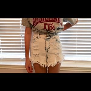 Acid wash distressed denim shorts